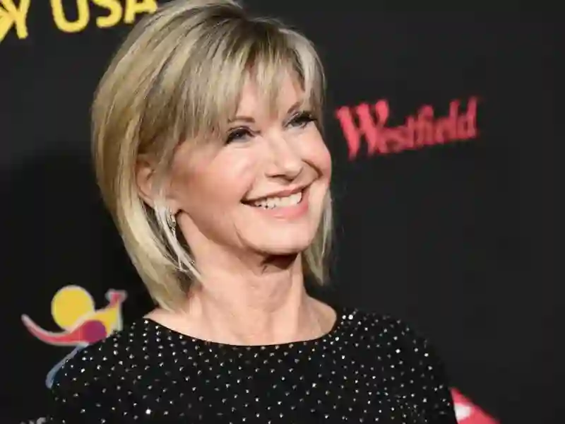 20220809 olivia newton john papo de cinema