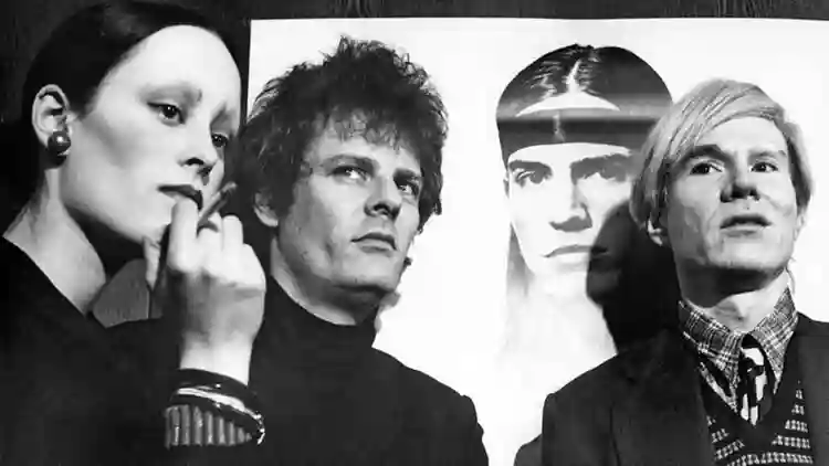 Paul Morrissey, ícone do cinema underground norte-americano, morre aos 86 anos 2 Jane Forth, Paul Morrissey e Andy Warhol em 1971. Foto/divulgação