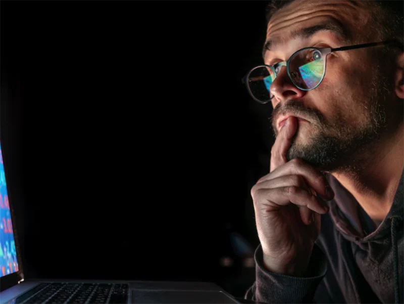 20250704 a man analyzing stock market charts financial data on an electronic board free photo
